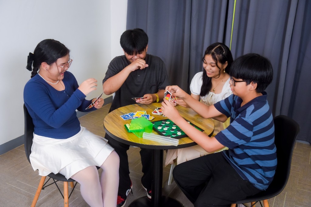 Teen Encounter friends playing games together